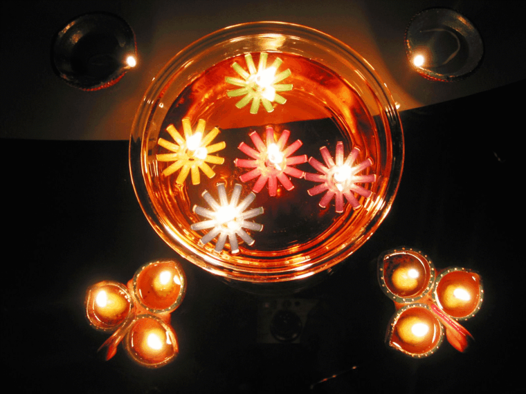 originales velas flotantes forma estrella
