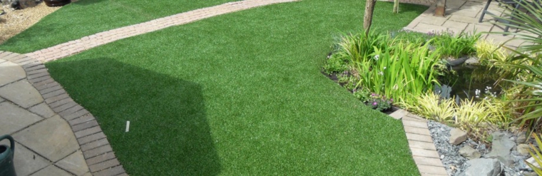 diseños parcelas cesped verde
