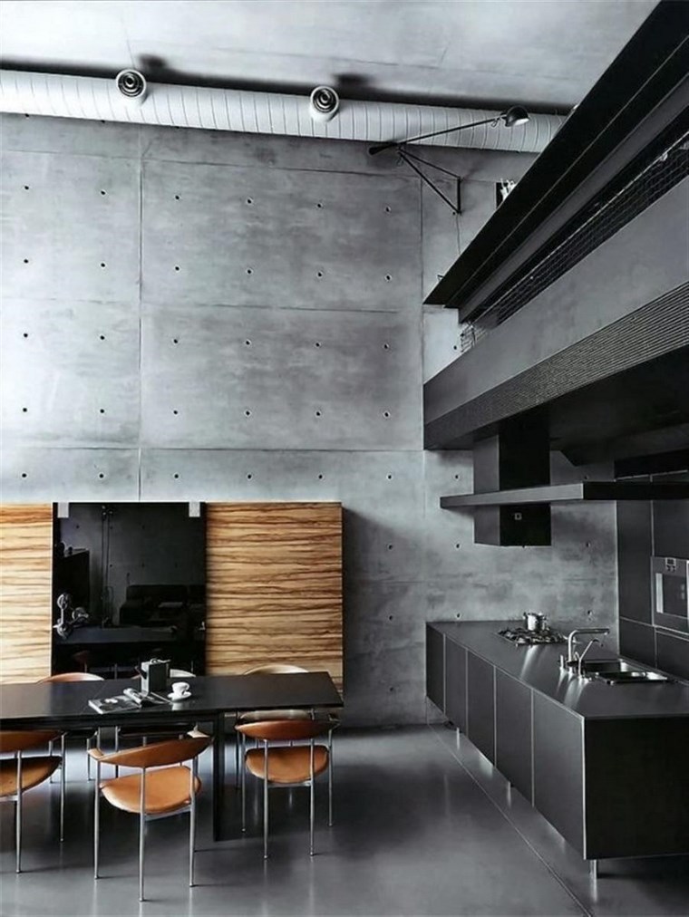 cocina elegante con pared de hormigón pared hormigon expuesto cocina negra elegante diseno ideas