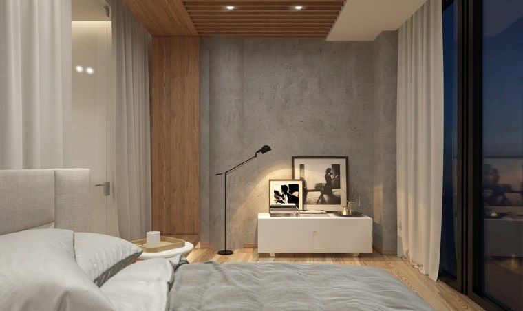 dormitorio con pared de hormigón y ventana grande pared hormigon expuesto muebles blancos dormitorios ideas