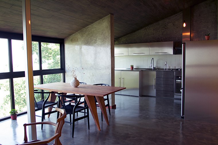 cocina separada del comedor pared hormigon expuesto separa cocina comedor ideas