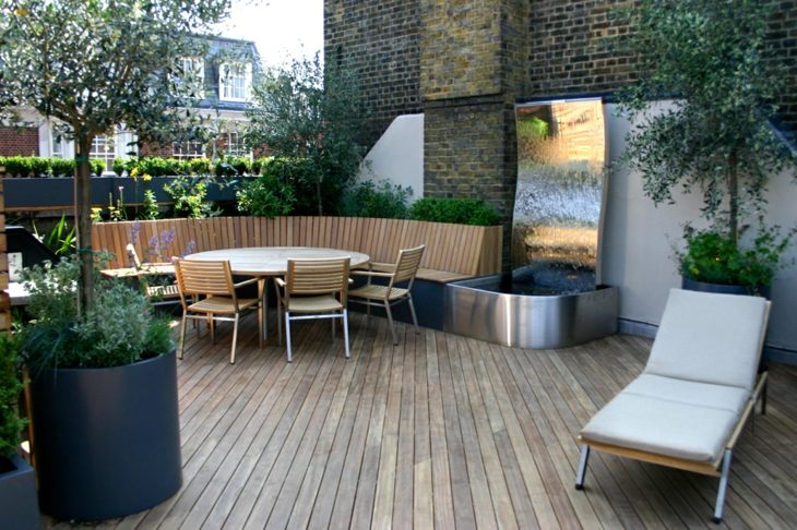 decorar terrazas salones modernos grises plantas