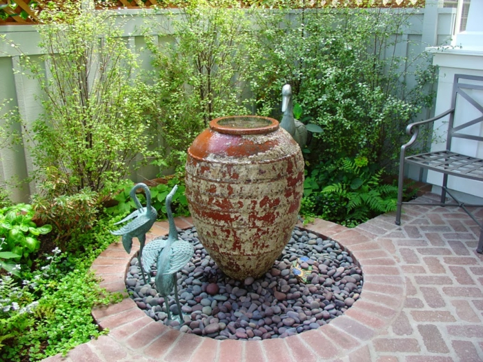 suelo de adoquines en el jardín imagenes paisaje jardin pajaros decorativos ideas