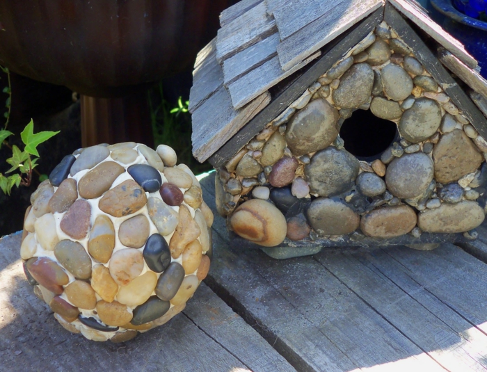 ideas de diseño para patios jardines esfera rocas especiales muestras artificiales