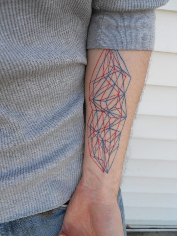 tatuajes en el brazo opciones diseno geometrico color ideas