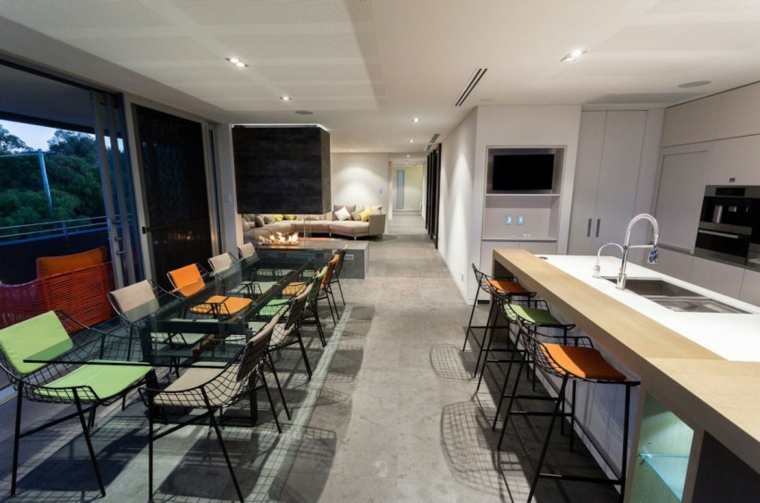 comedor y cocina con suelo de piedra suelo radiante piedra Dane Design Australia ideas