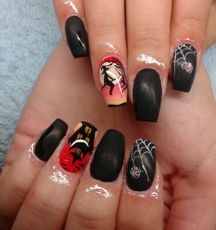 diseños de uñas en rojo y negro manicura inspirada aranas brujas toques