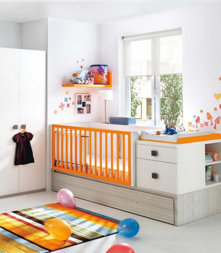 detalles de color naranja en el dormitorio dormitorios de bebes diseno cuna blanco naranja ideas