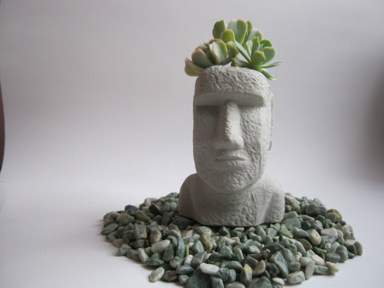 estatua decorada plantas cabeza
