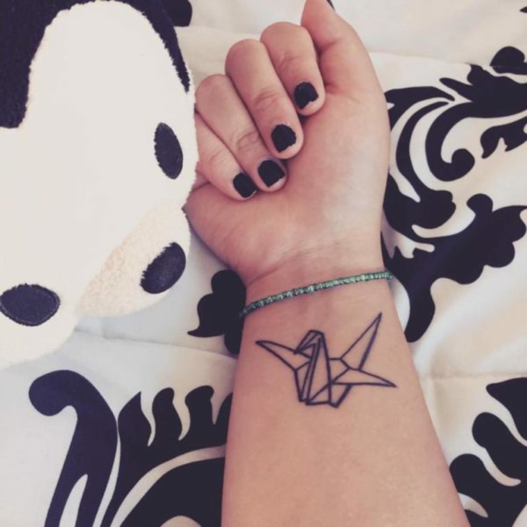 tatuaje pajarita de papel