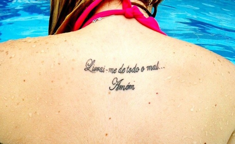 tatuajes diseño espalda mujer religiosos
