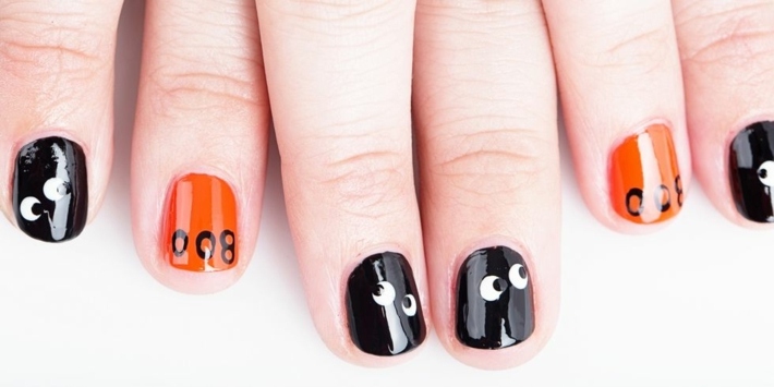 diseños de uñas negro naranja