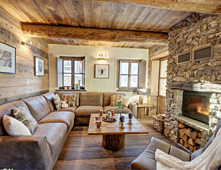 sofa-cuero-chimenea-piedra-pared-techo-madera