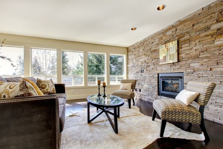 Living room with stone wall