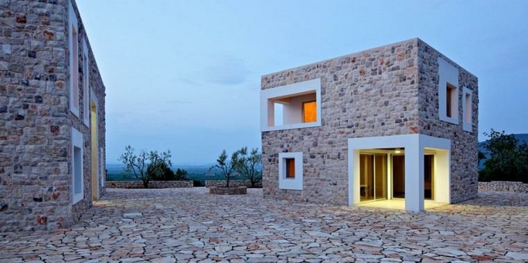 as fachadas de piedra natural son más eficientes en términos de energía y menos costosas que el vidrio