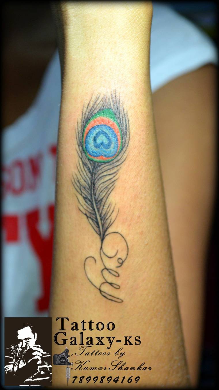tatuaje-pluma-ideas-brazo