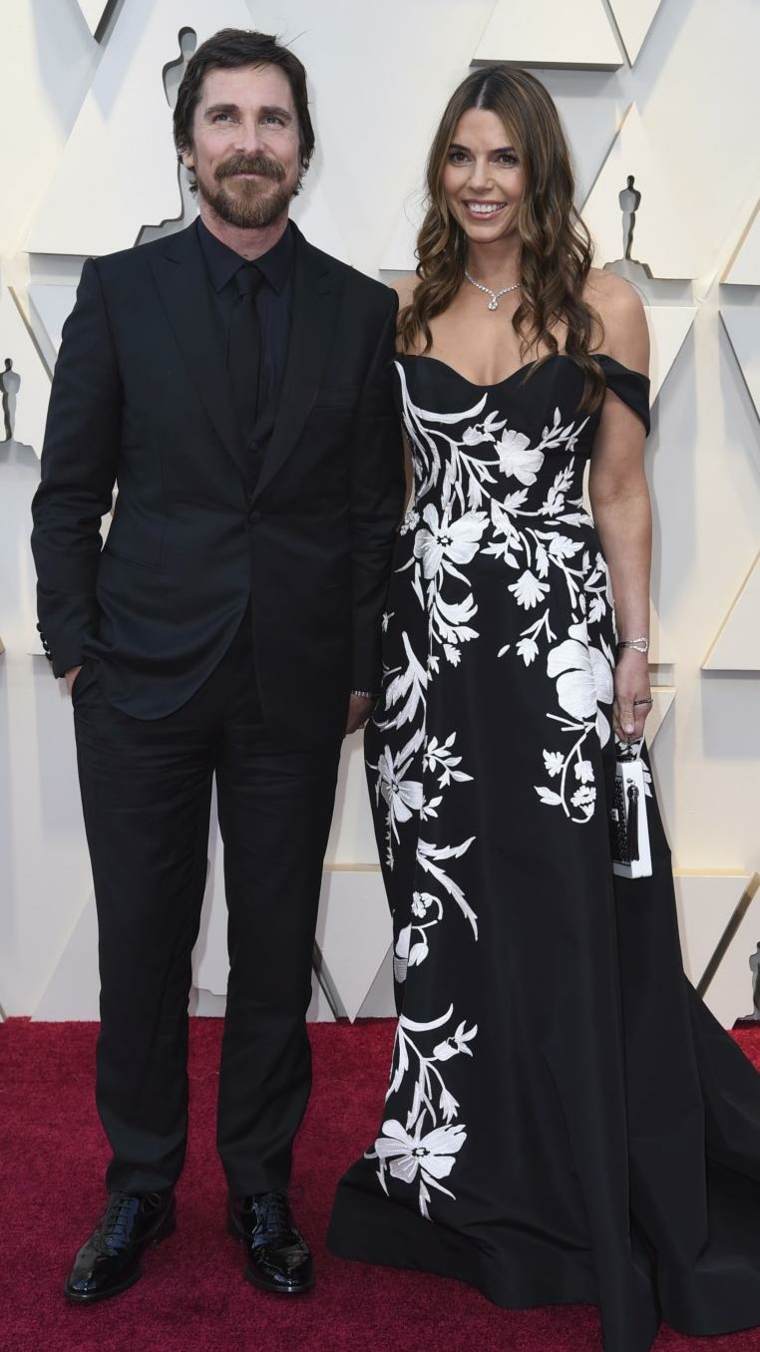 parejas-Christian-Bale-Sibi-Blazic-2019-Oscars