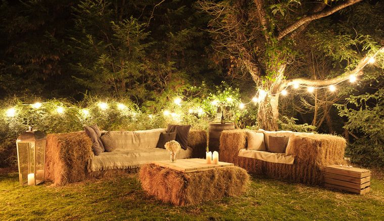 Decoración rústica para transformar tu patio trasero en un oasis natural