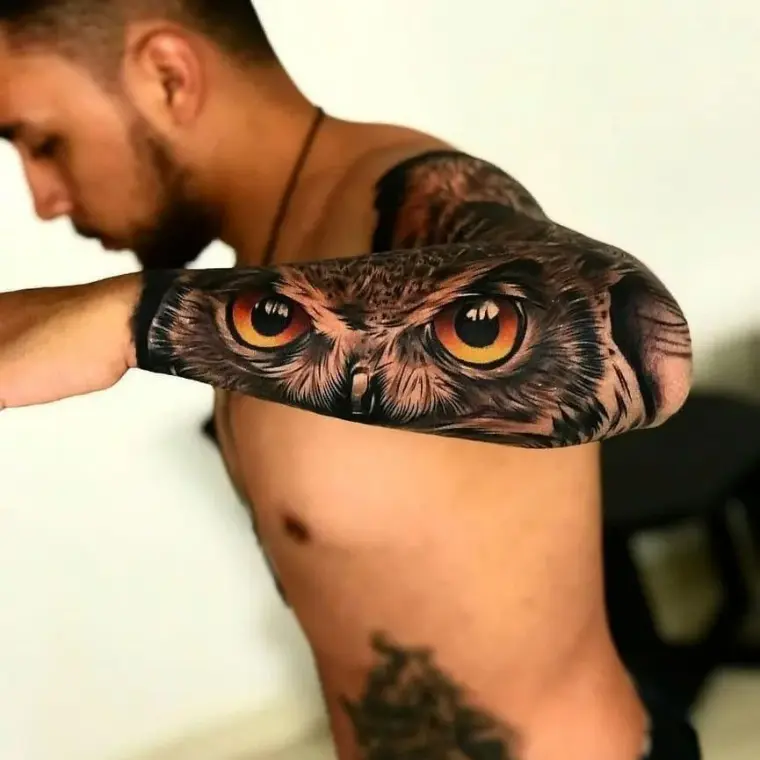 búho tattoo antebrazo